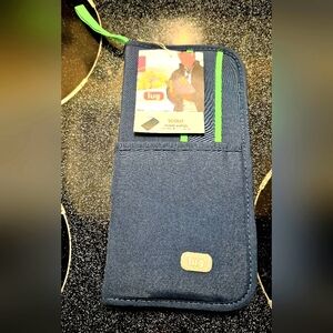 NWT LUG "Scout" travel wallet. Wrist handle,pockets for passport & boarding pass